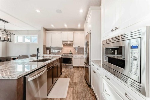 95 Marquis Crescent Se, Calgary, AB - Indoor Photo Showing Kitchen With Stainless Steel Kitchen With Double Sink With Upgraded Kitchen