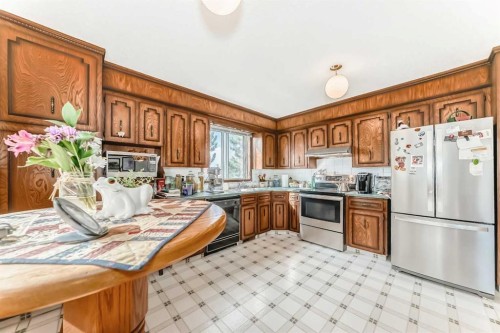 108 Jensen Place Ne, Airdrie, AB - Indoor Photo Showing Kitchen