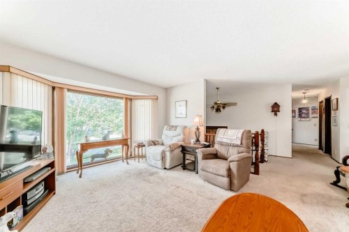 108 Jensen Place Ne, Airdrie, AB - Indoor Photo Showing Living Room