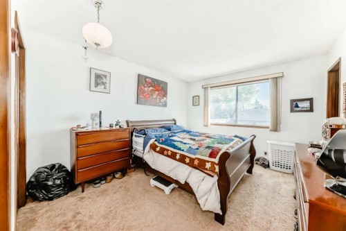 108 Jensen Place Ne, Airdrie, AB - Indoor Photo Showing Bedroom