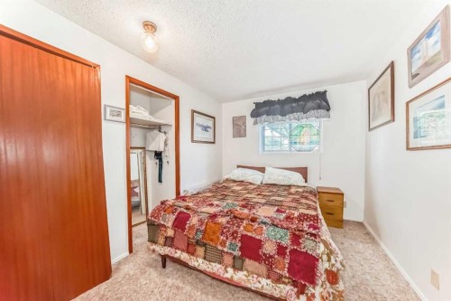 108 Jensen Place Ne, Airdrie, AB - Indoor Photo Showing Bedroom