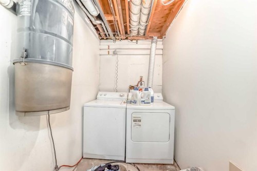 108 Jensen Place Ne, Airdrie, AB - Indoor Photo Showing Laundry Room