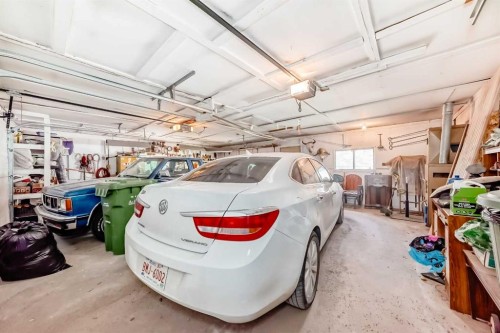 108 Jensen Place Ne, Airdrie, AB - Indoor Photo Showing Garage