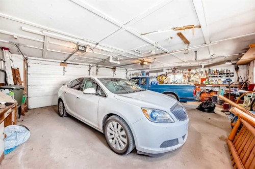108 Jensen Place Ne, Airdrie, AB - Indoor Photo Showing Garage
