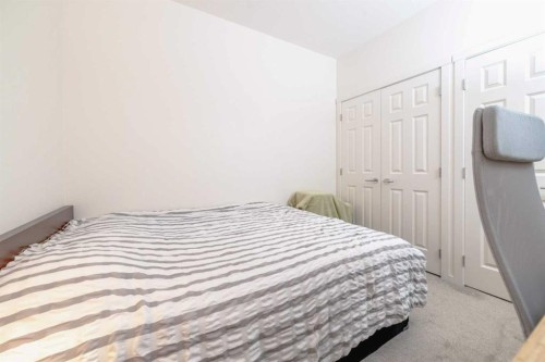 7216-151 Legacy Main Street Se, Calgary, AB - Indoor Photo Showing Bedroom