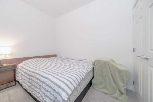 7216-151 Legacy Main Street Se, Calgary, AB - Indoor Photo Showing Bedroom
