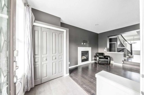 356 Auburn Crest Way Se, Calgary, AB - Indoor Photo Showing Other Room With Fireplace