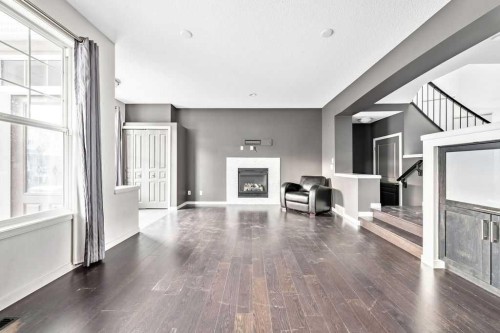 356 Auburn Crest Way Se, Calgary, AB - Indoor Photo Showing Living Room With Fireplace