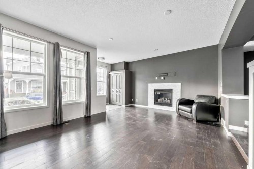 356 Auburn Crest Way Se, Calgary, AB - Indoor Photo Showing Living Room With Fireplace