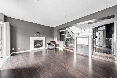 356 Auburn Crest Way Se, Calgary, AB - Indoor Photo Showing Living Room With Fireplace