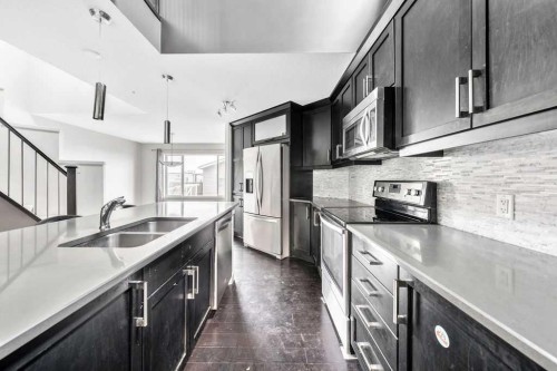 356 Auburn Crest Way Se, Calgary, AB - Indoor Photo Showing Kitchen With Stainless Steel Kitchen With Double Sink With Upgraded Kitchen