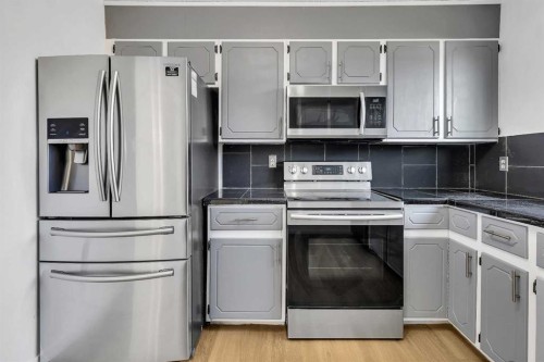 20 Whitmire Road Ne, Calgary, AB - Indoor Photo Showing Kitchen