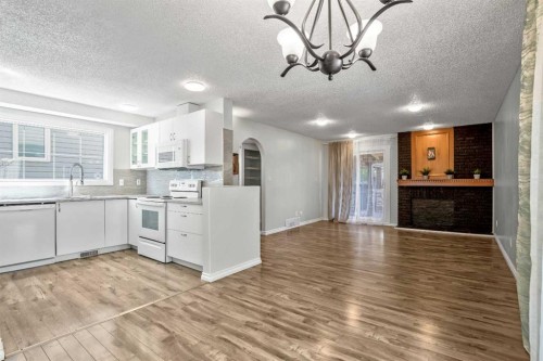 29 Woodglen Crescent Sw, Calgary, AB - Indoor Photo Showing Kitchen With Double Sink
