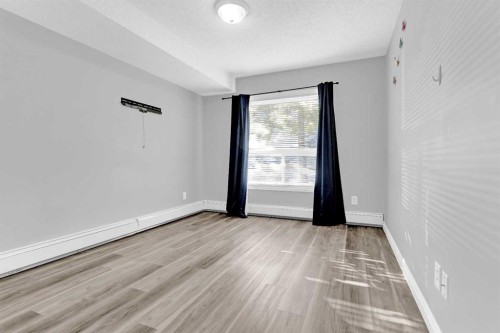 103-5555 Falsbridge Drive Ne, Calgary, AB - Indoor Photo Showing Other Room