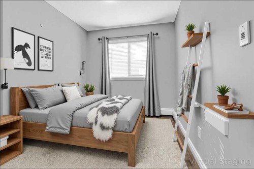 103-5555 Falsbridge Drive Ne, Calgary, AB - Indoor Photo Showing Bedroom