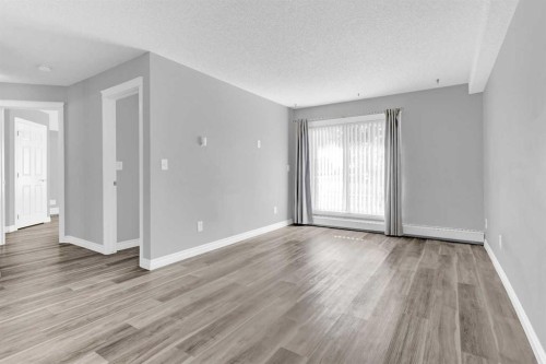 103-5555 Falsbridge Drive Ne, Calgary, AB - Indoor Photo Showing Other Room