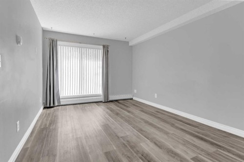 103-5555 Falsbridge Drive Ne, Calgary, AB - Indoor Photo Showing Other Room