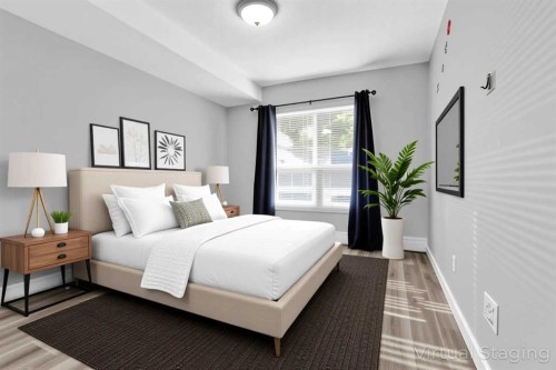 103-5555 Falsbridge Drive Ne, Calgary, AB - Indoor Photo Showing Bedroom