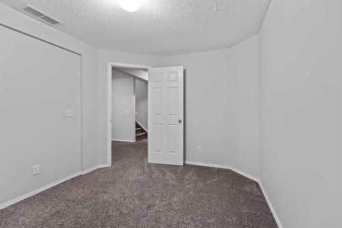14 Tarington Park Ne, Calgary, AB - Indoor Photo Showing Other Room