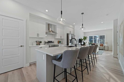 344 Fireside Drive, Cochrane, AB - Indoor Photo Showing Kitchen With Upgraded Kitchen