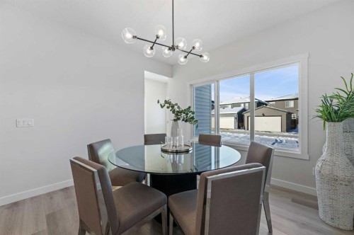 344 Fireside Drive, Cochrane, AB - Indoor Photo Showing Dining Room