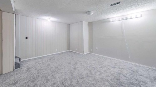 268 Falton Drive Ne, Calgary, AB - Indoor Photo Showing Other Room
