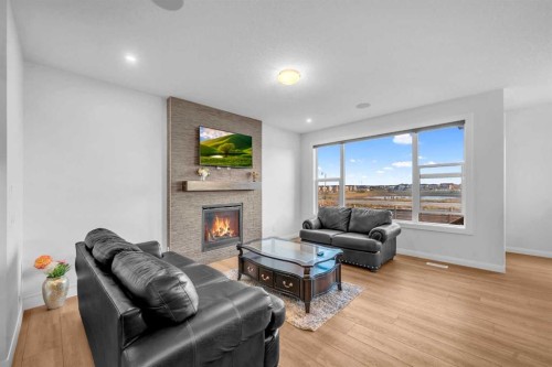 628 West Lakeview Drive, Chestermere, AB - Indoor Photo Showing Living Room With Fireplace