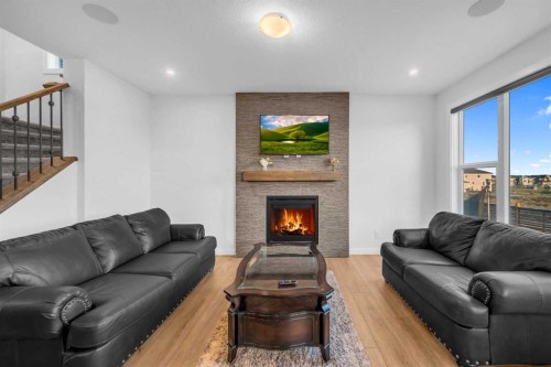 628 West Lakeview Drive, Chestermere, AB - Indoor Photo Showing Living Room With Fireplace