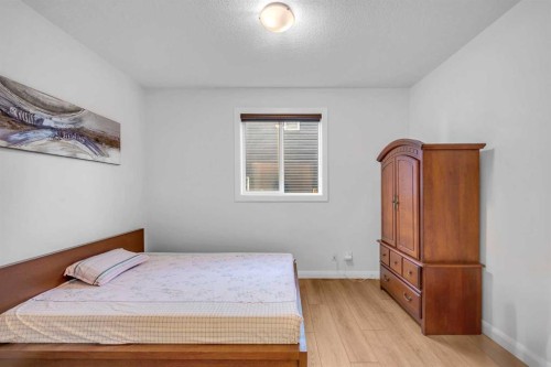 628 West Lakeview Drive, Chestermere, AB - Indoor Photo Showing Bedroom