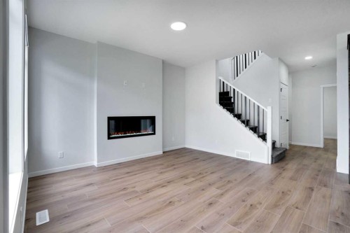 8 Corner Glen Row Ne, Calgary, AB - Indoor With Fireplace