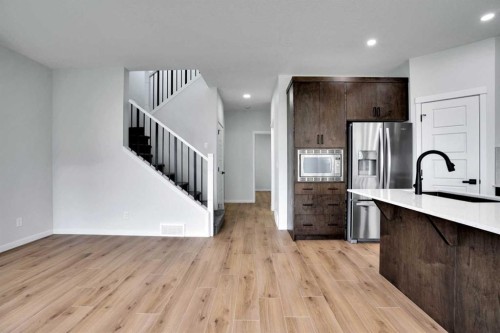 8 Corner Glen Row Ne, Calgary, AB - Indoor Photo Showing Kitchen With Upgraded Kitchen