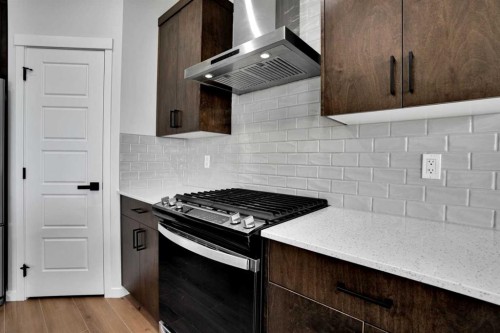 8 Corner Glen Row Ne, Calgary, AB - Indoor Photo Showing Kitchen With Upgraded Kitchen