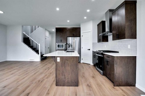 8 Corner Glen Row Ne, Calgary, AB - Indoor Photo Showing Kitchen With Upgraded Kitchen
