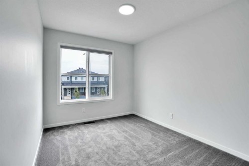 8 Corner Glen Row Ne, Calgary, AB - Indoor Photo Showing Other Room
