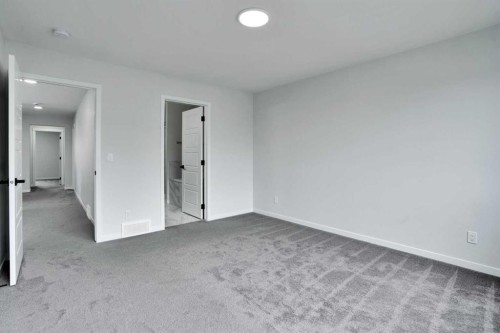 8 Corner Glen Row Ne, Calgary, AB - Indoor Photo Showing Other Room