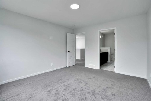 8 Corner Glen Row Ne, Calgary, AB - Indoor Photo Showing Other Room