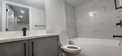 8 Corner Glen Row Ne, Calgary, AB - Indoor Photo Showing Bathroom