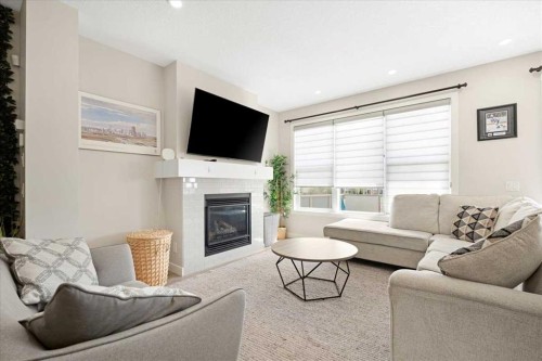 89 Sage Bluff Rise Nw, Calgary, AB - Indoor Photo Showing Living Room With Fireplace