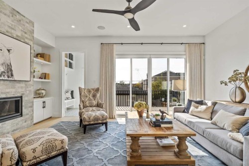 2131 32 Avenue Sw, Calgary, AB - Indoor Photo Showing Living Room With Fireplace