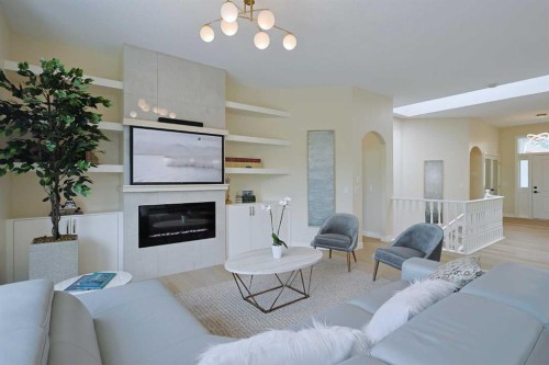 271 Hamptons Terrace Nw, Calgary, AB - Indoor Photo Showing Living Room With Fireplace
