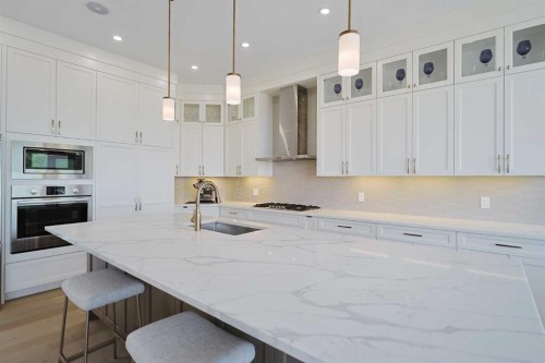 271 Hamptons Terrace Nw, Calgary, AB - Indoor Photo Showing Kitchen With Upgraded Kitchen