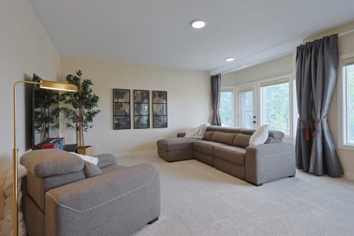 271 Hamptons Terrace Nw, Calgary, AB - Indoor Photo Showing Living Room