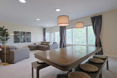 271 Hamptons Terrace Nw, Calgary, AB - Indoor Photo Showing Living Room