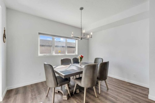 72 Creekside Boulevard Sw, Calgary, AB - Indoor Photo Showing Dining Room