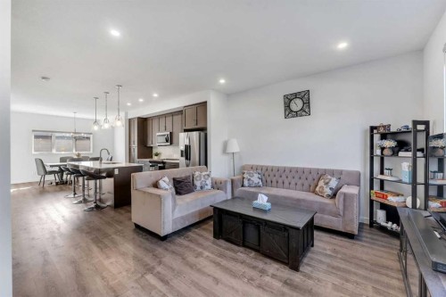 72 Creekside Boulevard Sw, Calgary, AB - Indoor Photo Showing Living Room