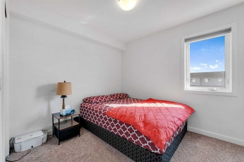 72 Creekside Boulevard Sw, Calgary, AB - Indoor Photo Showing Bedroom