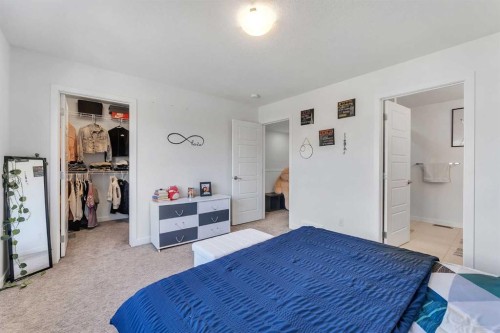 72 Creekside Boulevard Sw, Calgary, AB - Indoor Photo Showing Bedroom