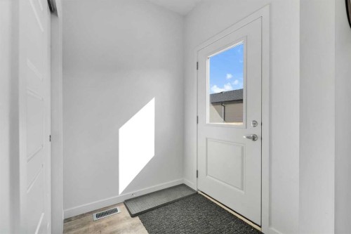 72 Creekside Boulevard Sw, Calgary, AB - Indoor Photo Showing Other Room