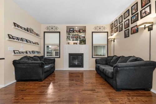 80 Legacy Crescent Se, Calgary, AB - Indoor Photo Showing Living Room With Fireplace