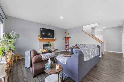 17 Saddlecrest Crescent Ne, Calgary, AB - Indoor Photo Showing Living Room With Fireplace